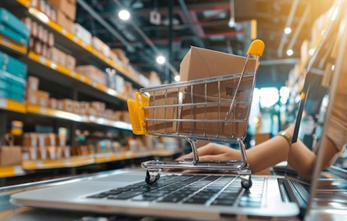 Two people shaking hands in office